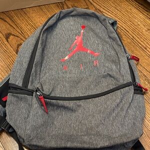 Nike Air Grey Backpack with Red Jumpman Logo